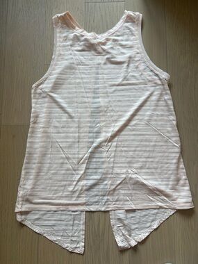 Lululemon light salmon colored tank with tie back detail size 6